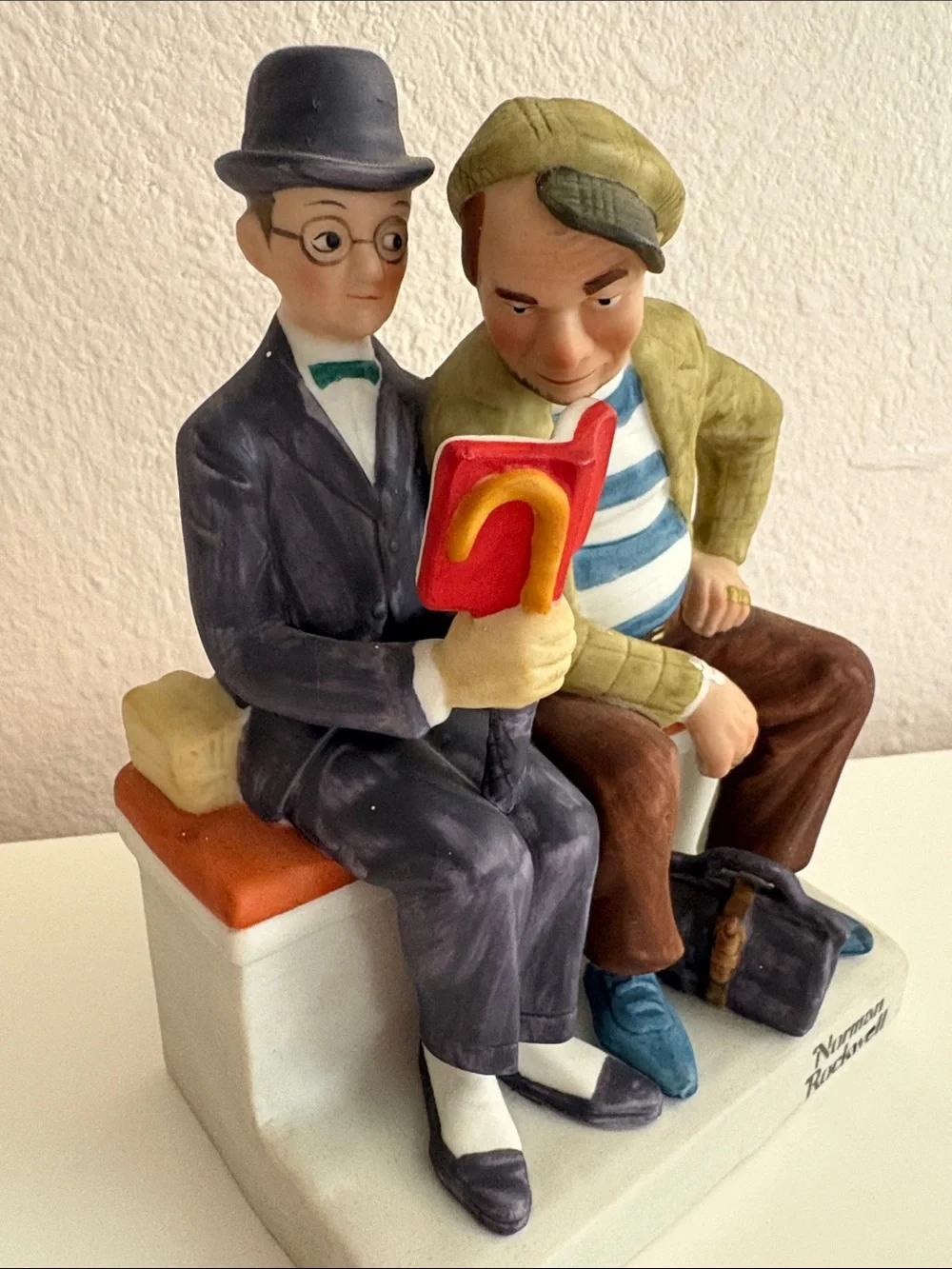 Norman Rockwell Two Men Reading Figurine — Red, Blue, Brown, Cream